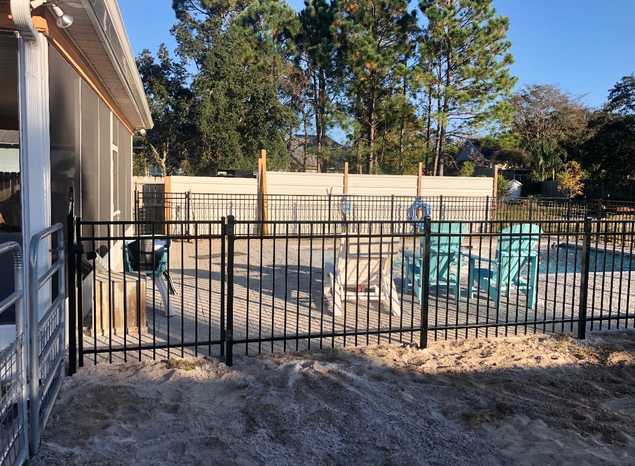 Photo of aluminum fence around a pool area