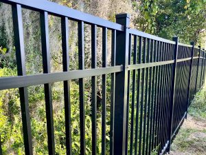Photo of a black aluminum fence in Panama City, FL by Mr. Fence of Florida
