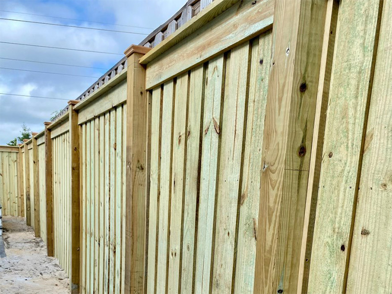 Freeport FL cap and trim style wood fence
