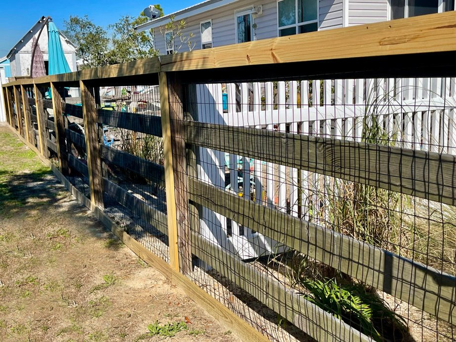 Ranch rail residential wood fencing in the Panama City, Florida area.