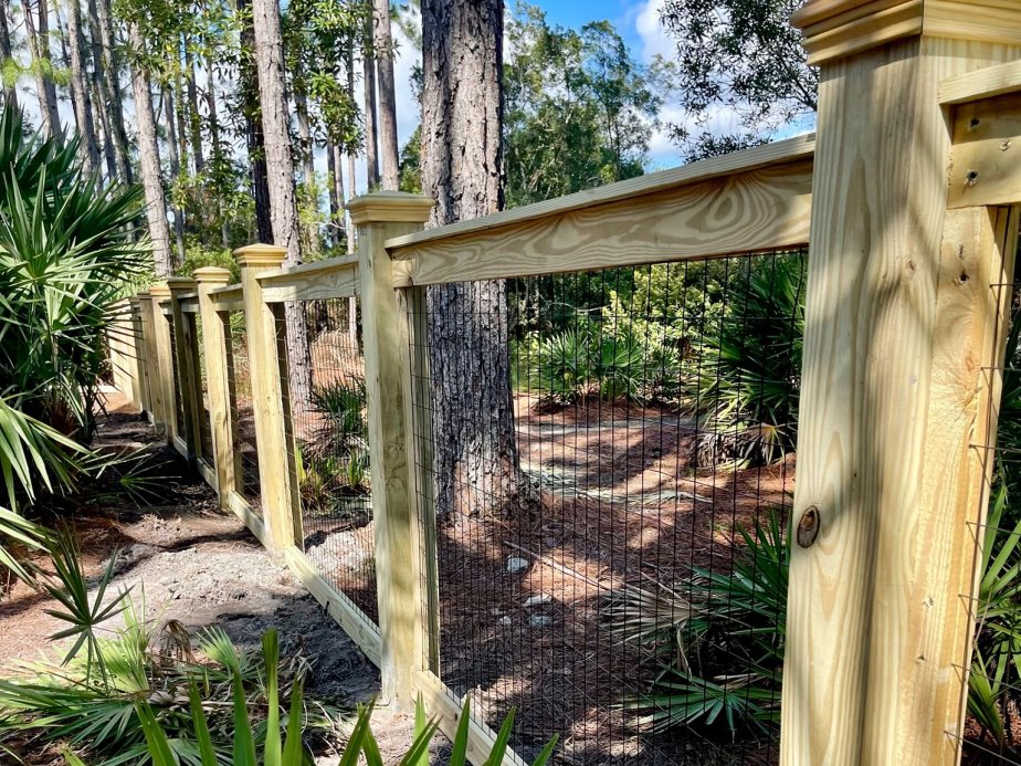 ranch-rail style wood fence in Panama City, FL
