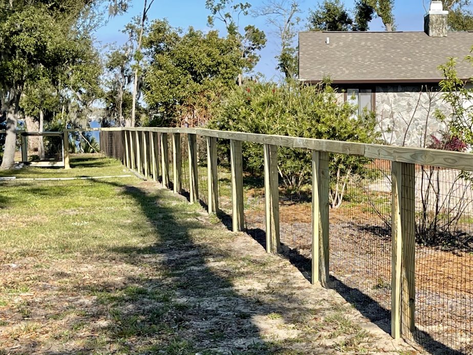 ranch-rail style wood fence in Panama City, FL