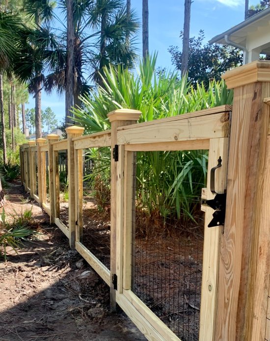 Beautiful example of a Ranch Rail style wood fence installed in Panama City, Florida